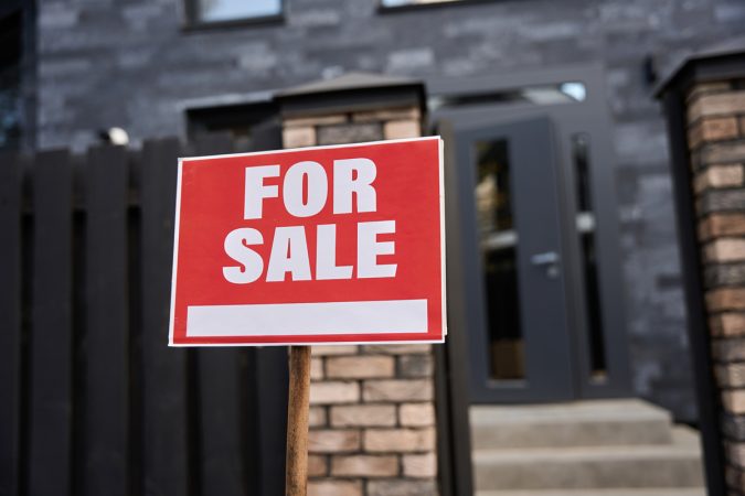 Sign for sale fixed on a stick